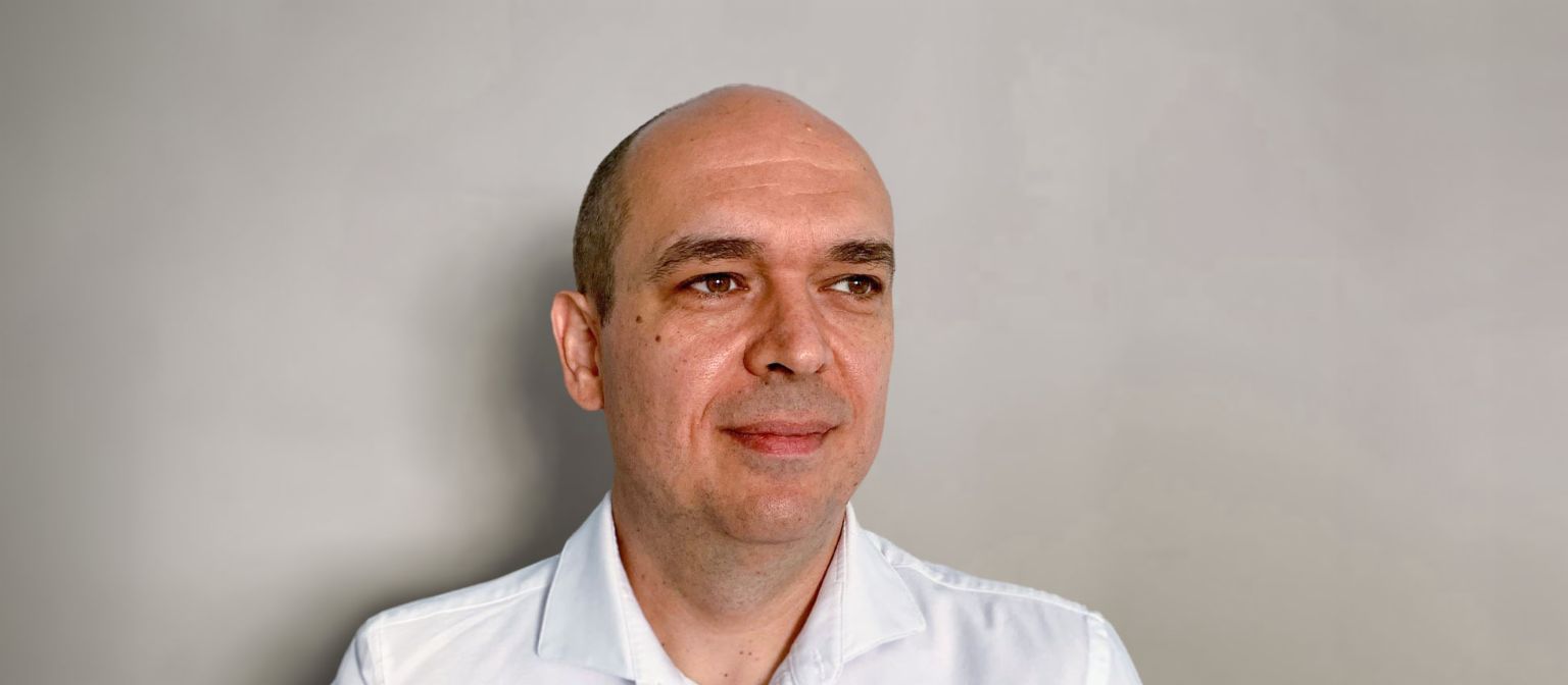 Ein Porträtfoto zeigt Cristi Musat, Managing Director EOS International BVG und „Kopf“ des Projekts Kollecto+